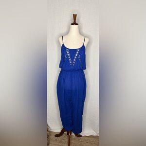 Absolutely beautiful boho blue jumpsuit with crochet detail